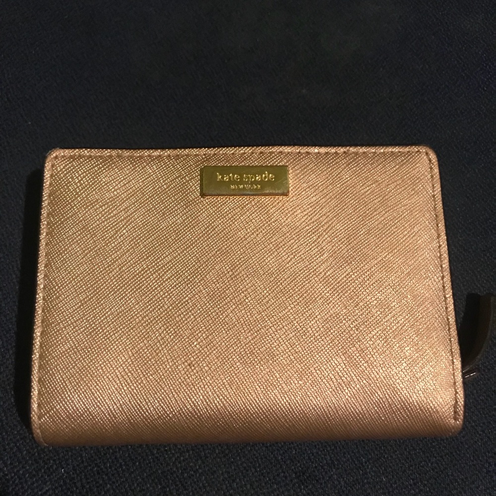 Kate Spade Rose Gold small wallet $25